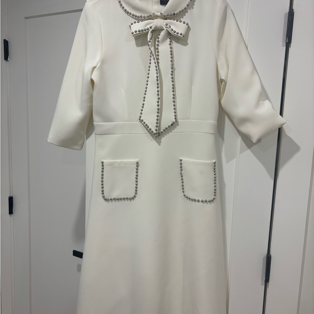 Elegant White Dress with Bow and Stud Accents